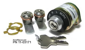 Round locking fuel cap kit with OFF/LOCK markings, two lock cylinders, a retention ring, three keys, and part number 11-03171 (Aircraft Spruce).